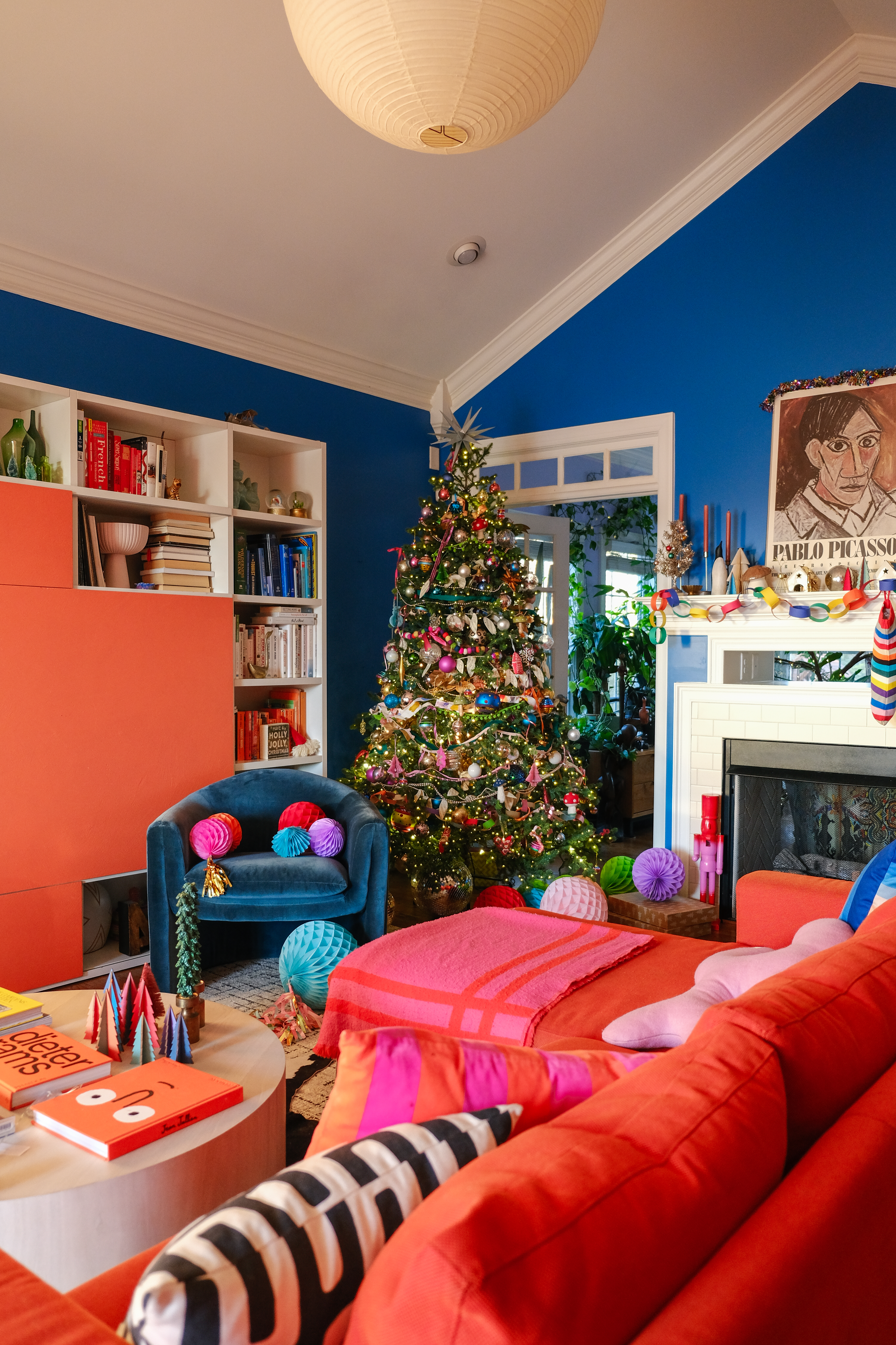 Christmas tree decorated with colorful vintage ornaments