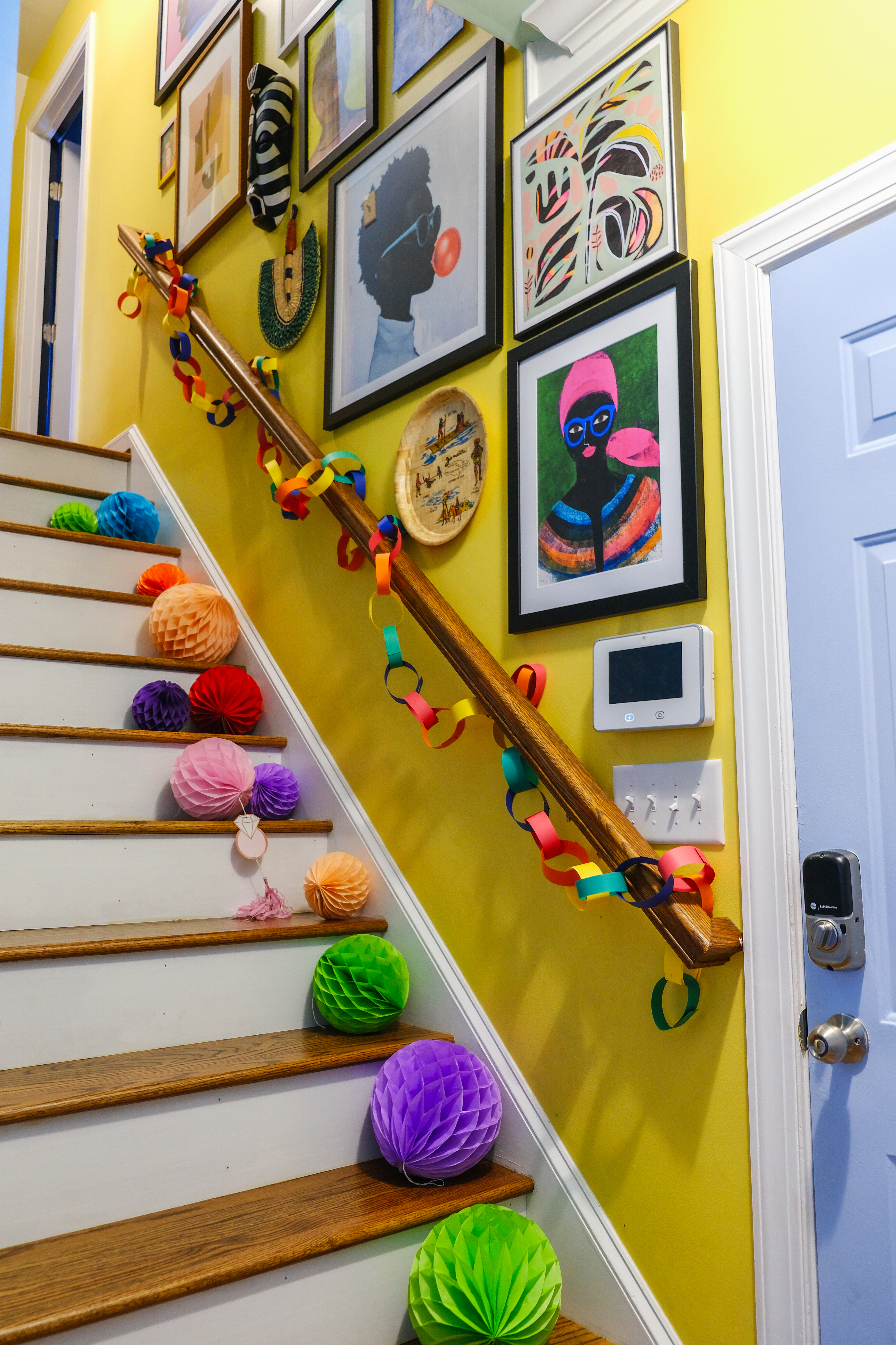Staircase decorated with paperchains and honeycombs for Christmas