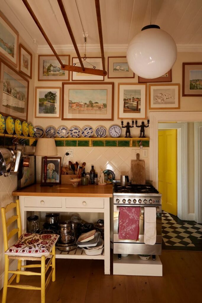 charming kitchen with beautiful wares and art