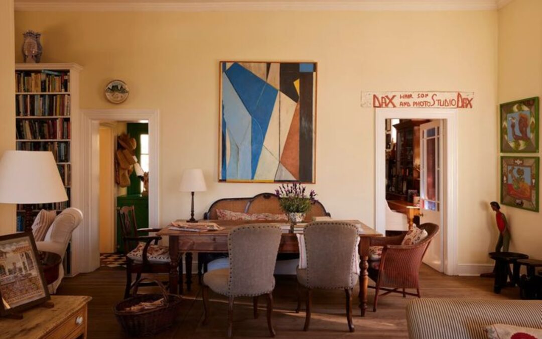 love the furnishings and oversized art in this delightful living room