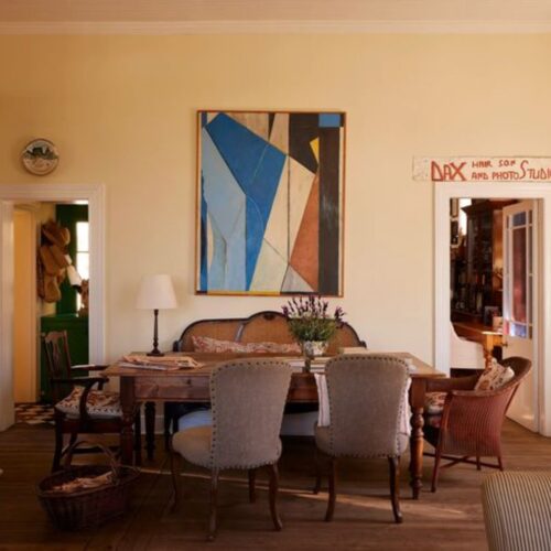 love the furnishings and oversized art in this delightful living room