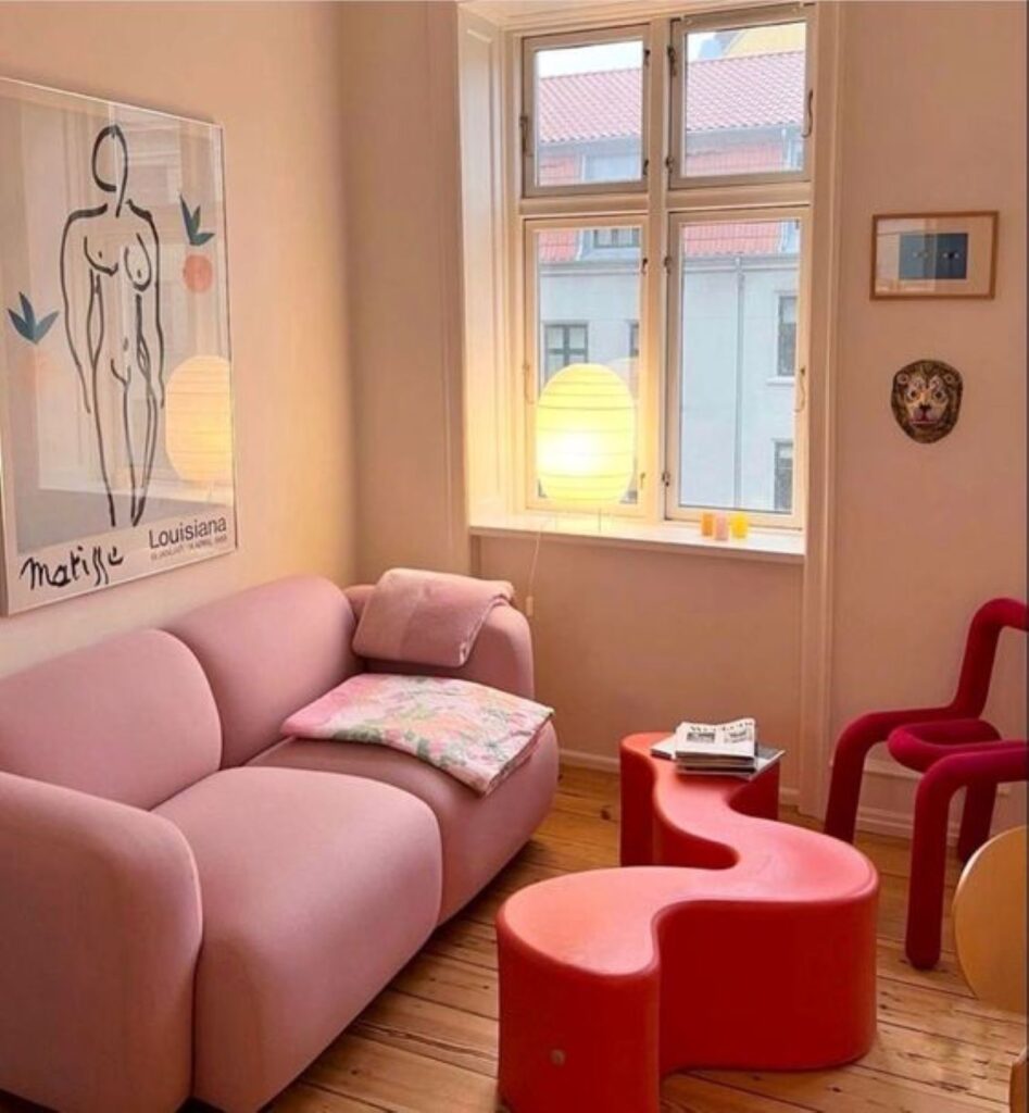 Living room with pink and red modern furniture
