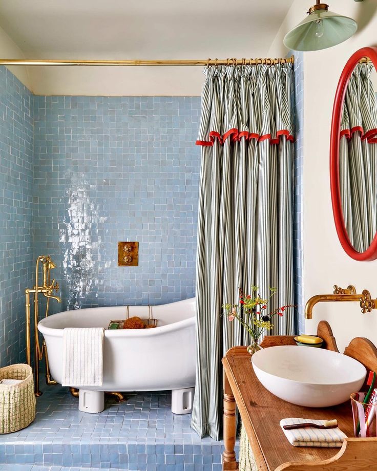 beautiful details in bathroom with pop of red 