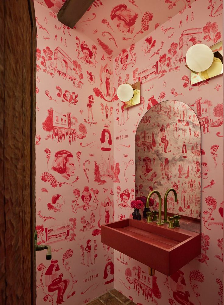 Powder room with a fabulous wallpaper