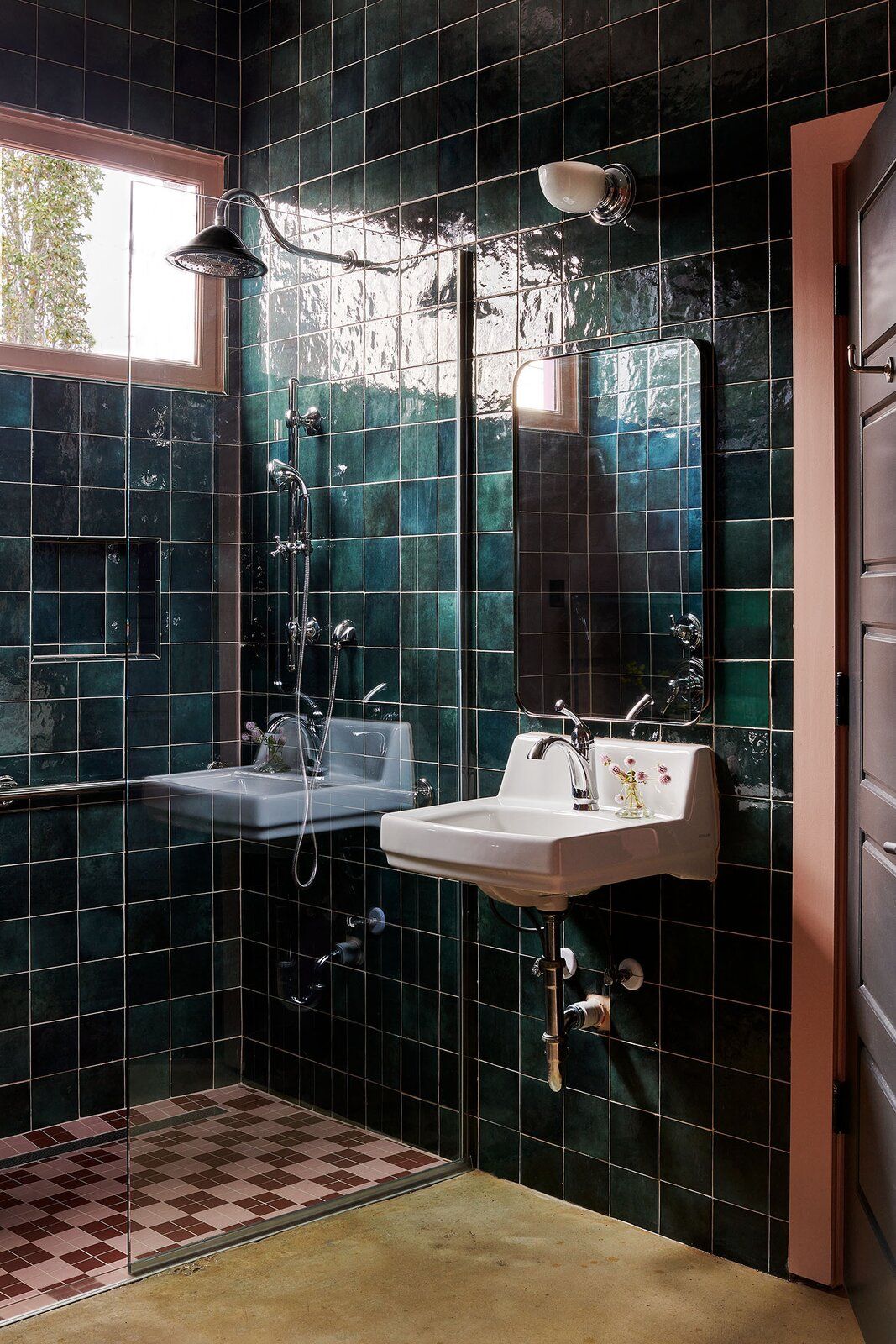 moody green tile in bathroom