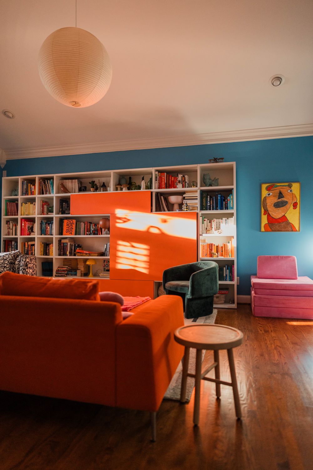 bold and colorful living room with golden sunlight