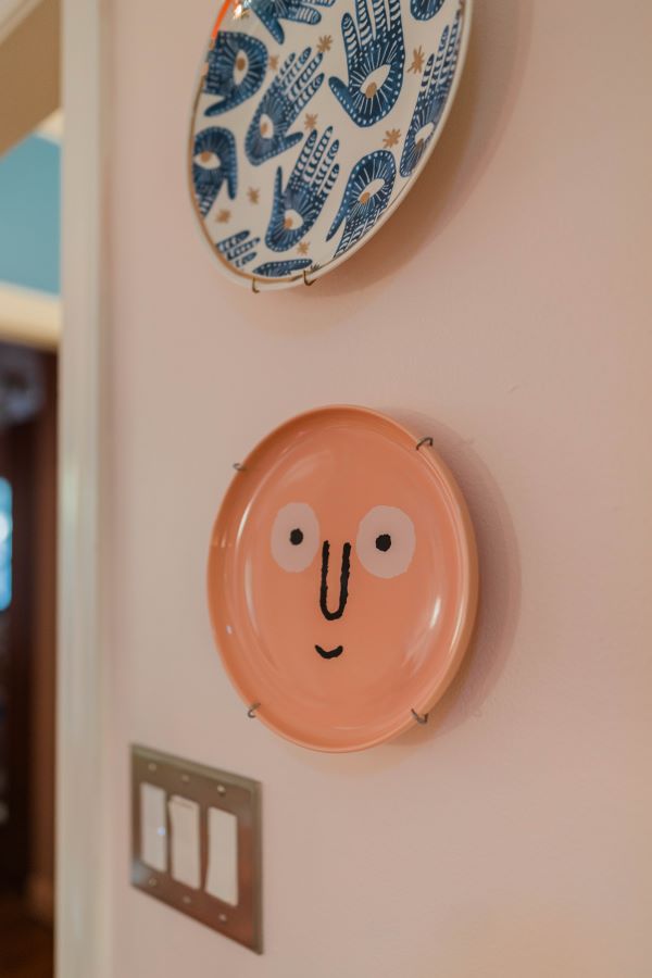 fun and quirky plates on wall