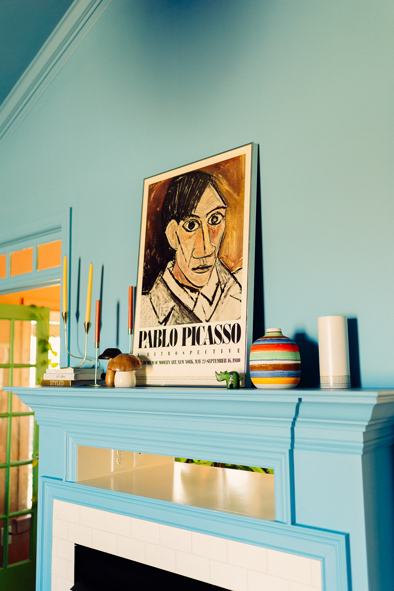 vintage Pablo Picasso art on mantel