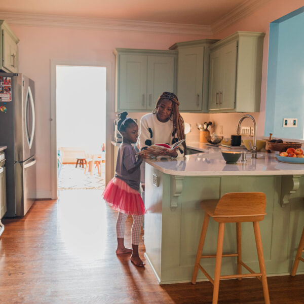 modern kitchen with mint green cabinets