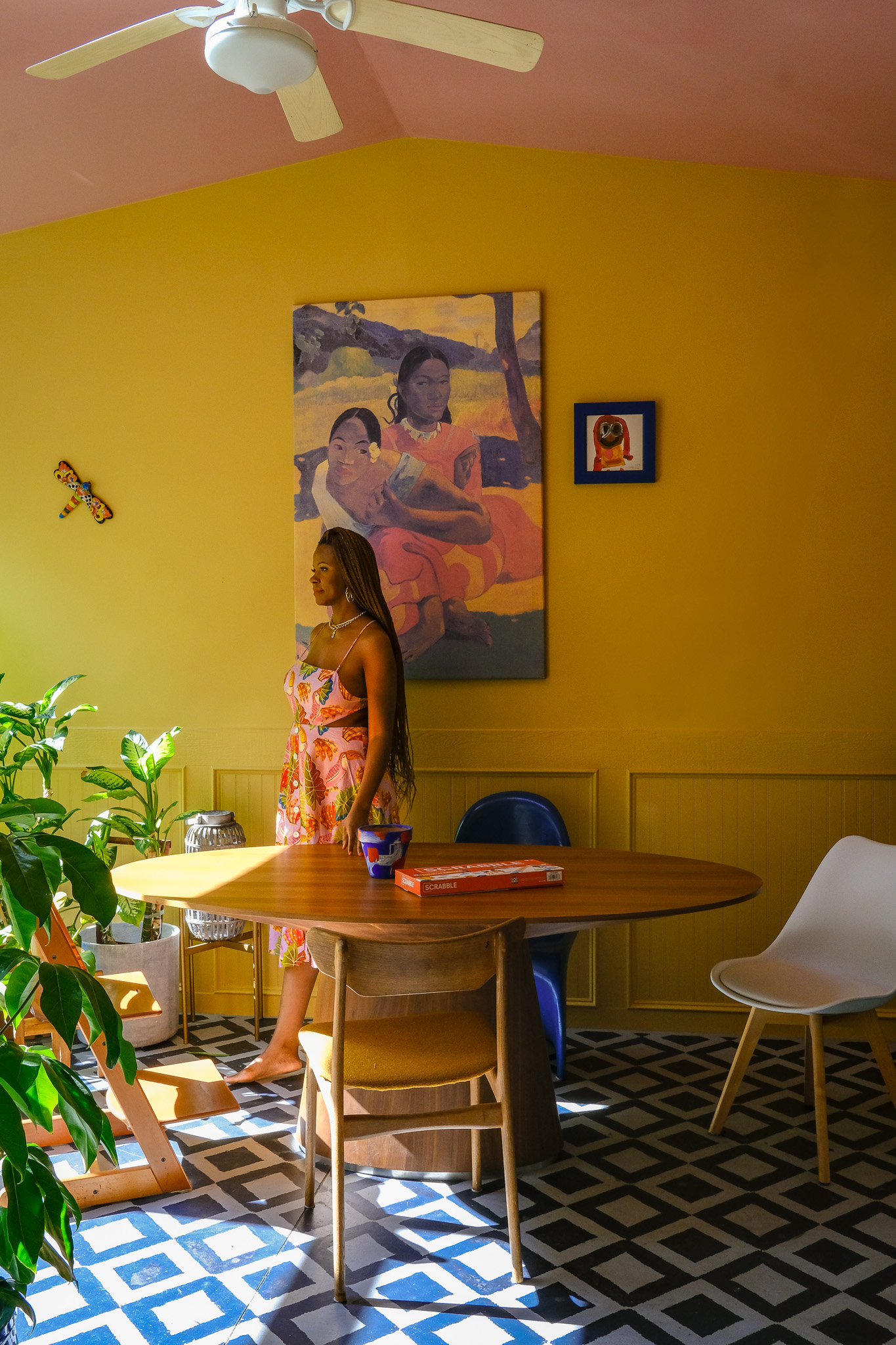 porch with butter yellow walls and pink ceiling