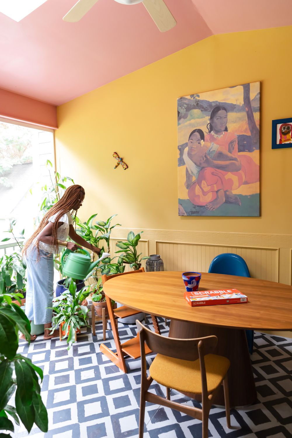 watering plants on screened in porch