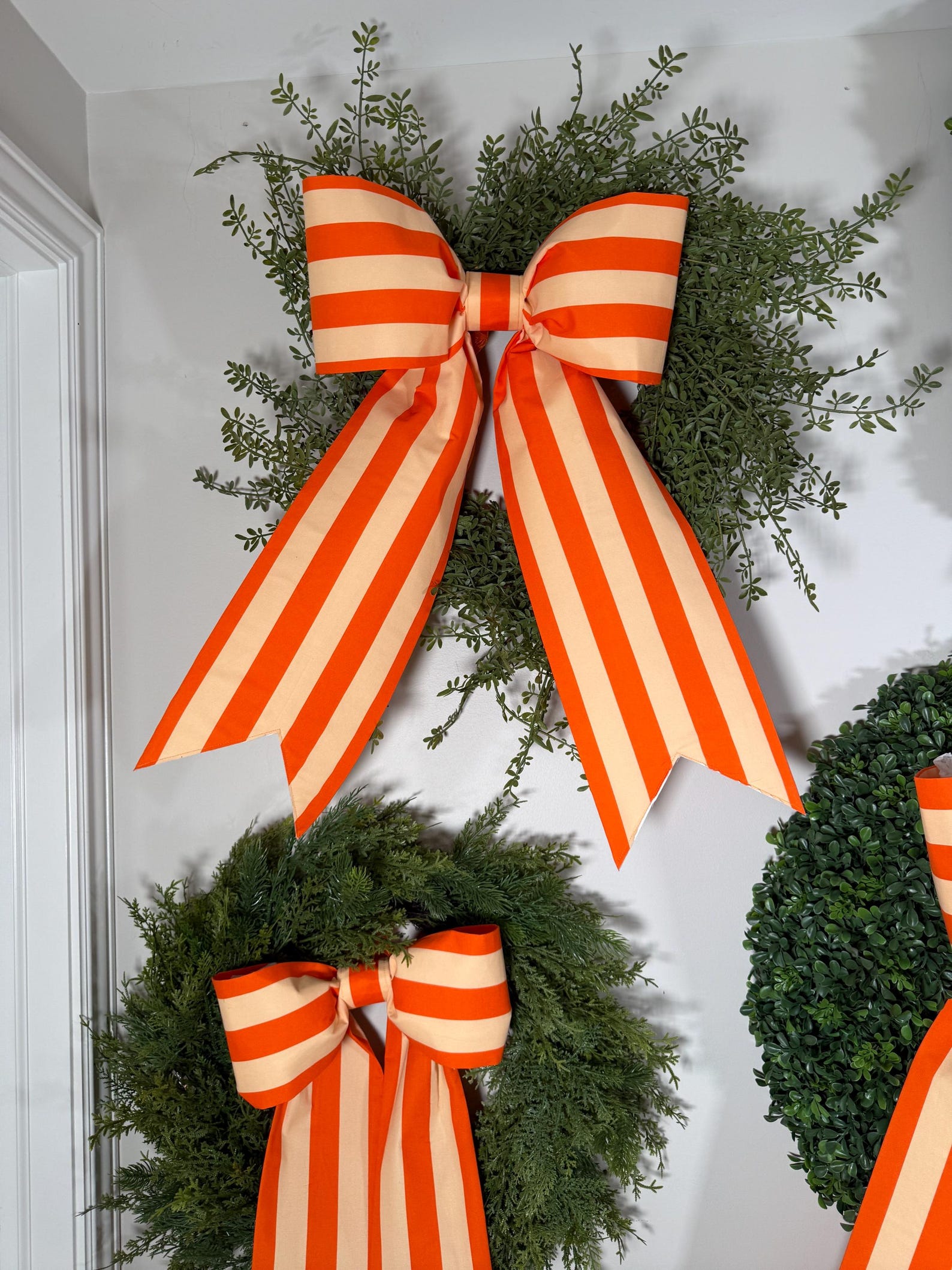 fall wreath with striped bow detail