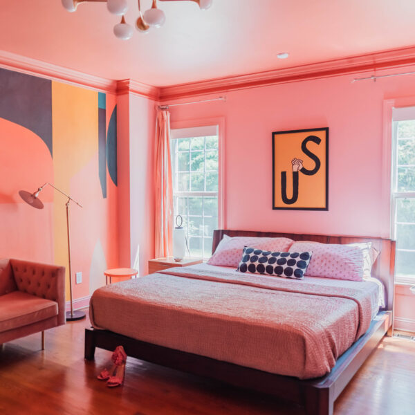 pink bedroom with modern mural